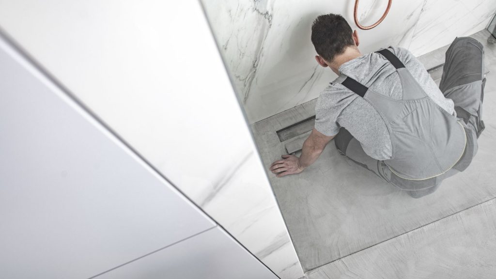 a plumbing checking a drain